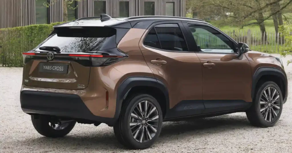 2026 Toyota Yaris Cross Facelift rear three-quarter view with connected LED tail lamps and sporty styling