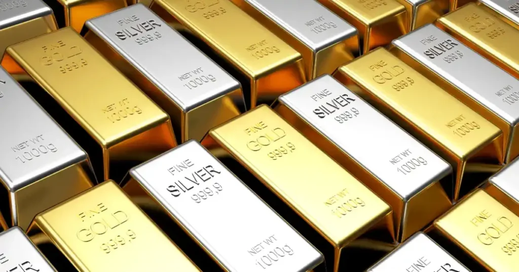 Gold and silver bullion bars stacked